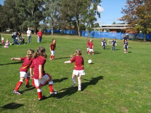 Jess with her Kit Kates team.  She is the one who just kicked the ball at the back